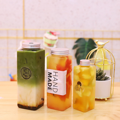 Garrafas de plástico à prova de vazamento isoladas personalizadas para bebidas