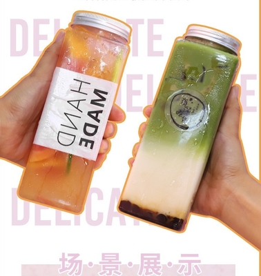 Garrafas de plástico à prova de vazamento isoladas personalizadas para bebidas