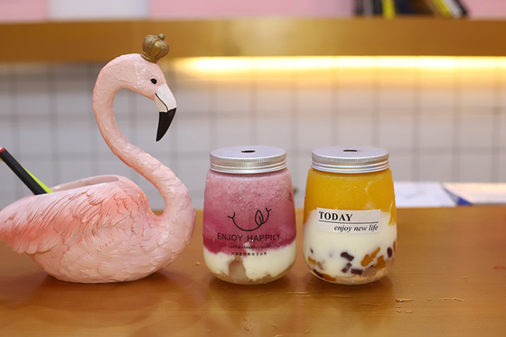 Garrafas de chá de leite de 350 ml, claras, elegantes para negócios.