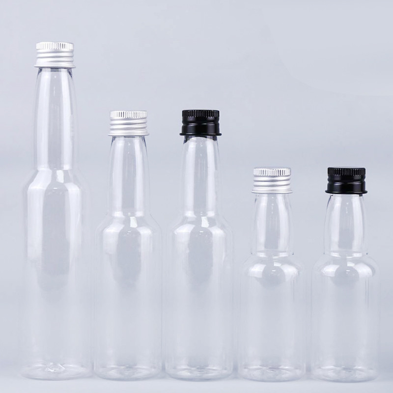 Venda Quente 50 ml de plástico PET transparente redondo garrafa de bebidas alcoólicas com tampa de alumínio